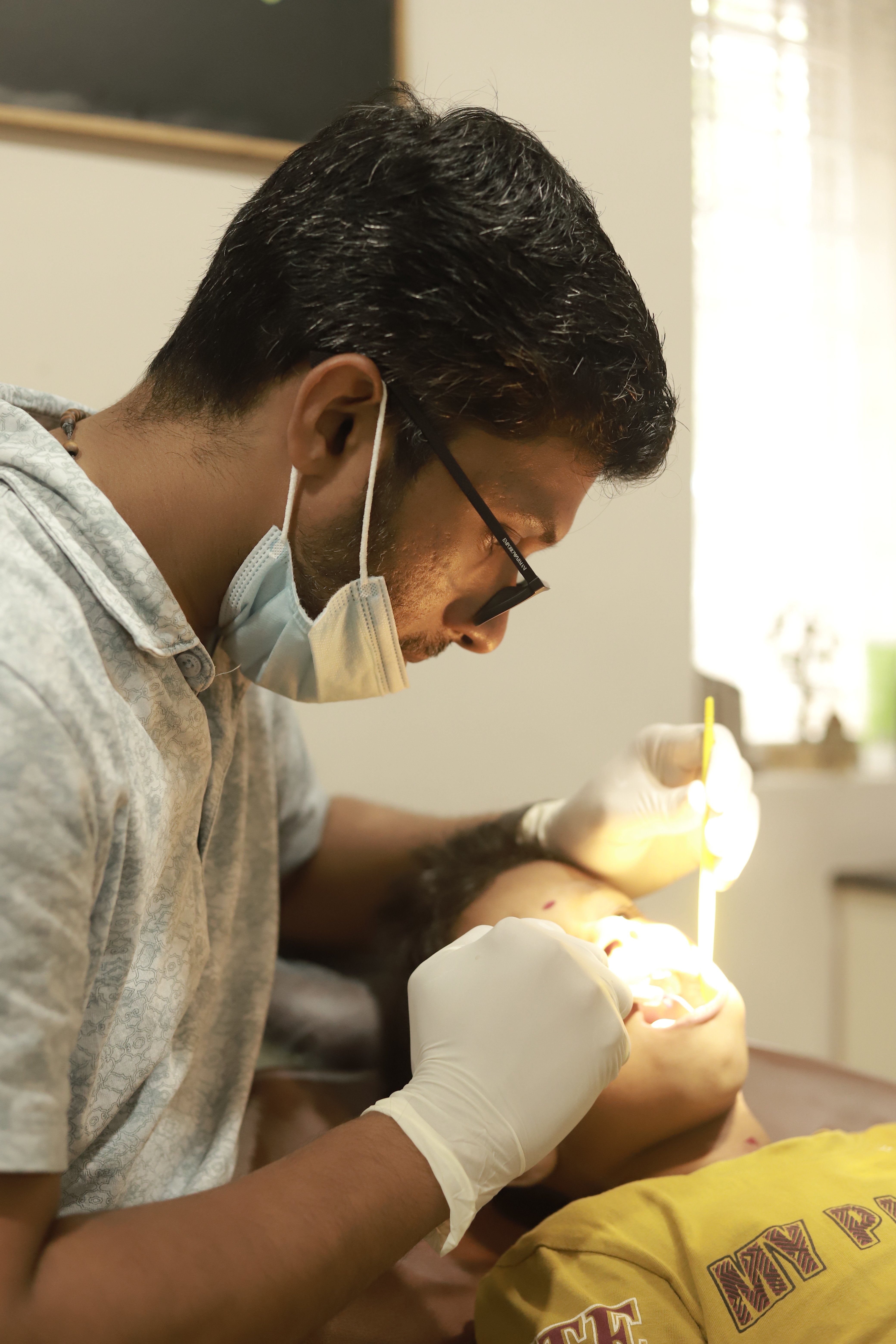 Dentist with patient